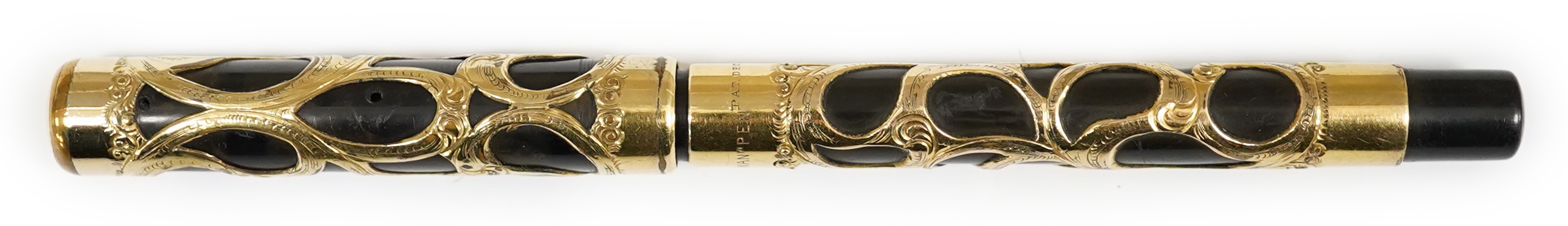 A Swan gold filled filigree Eyedropper, with an over and under feed